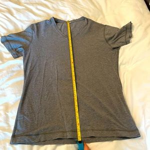 Lululemon gray v-neck shirt. Light, stretchy material. I believe a size 10 or L